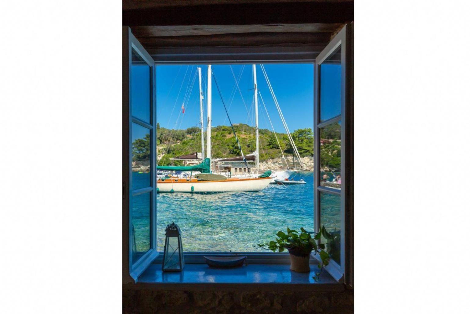 Spiros Jetty House Apartment Longós Екстериор снимка